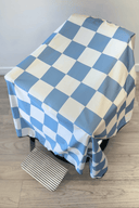 above shot of rally v2 blue checker barber cape 